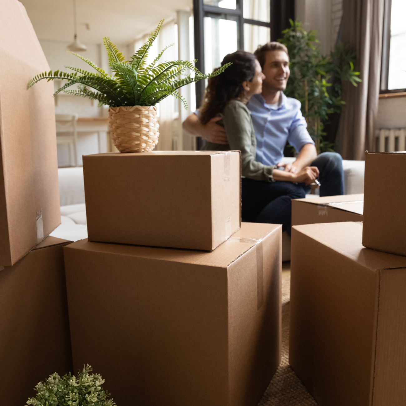 Family receiving keys to their new home after securing a home loan